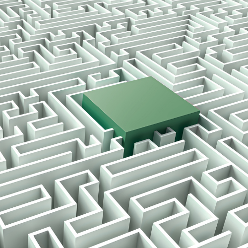 green cube inside a maze representing navigating complex business challenges